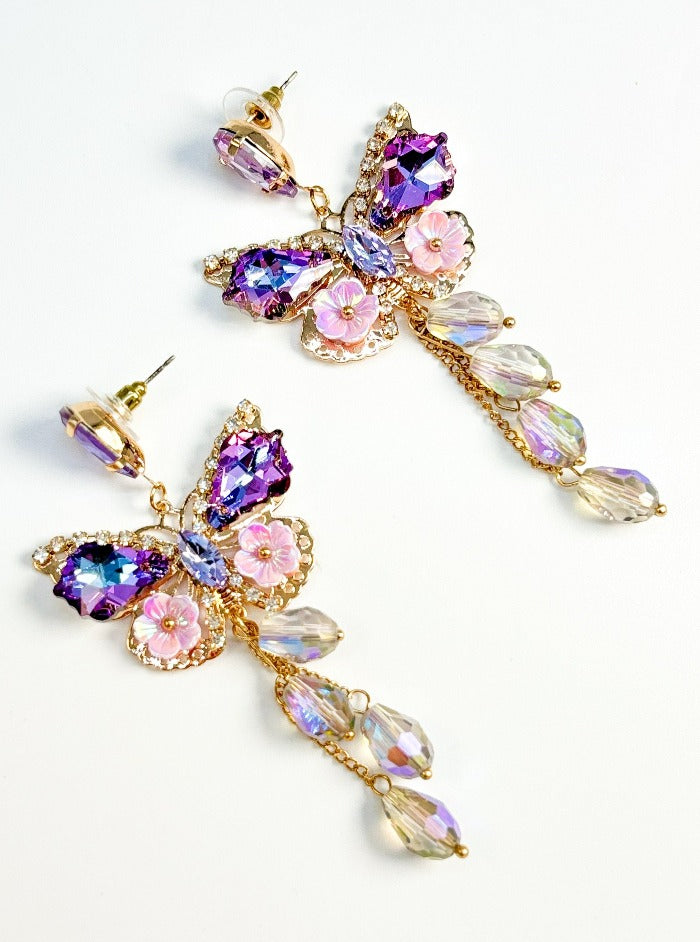 
                      
                        Haute Pink crystal Multi color Triangle studded Earrings
                      
                    